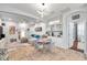 Open concept dining area with glass table and seating for four at 2602 W Nassau St, Tampa, FL 33607