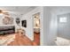 Upstairs hallway with access to bedrooms and bonus room at 2602 W Nassau St, Tampa, FL 33607