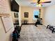 Home gym with stationary bike, weights and mirror at 2602 W Nassau St, Tampa, FL 33607