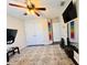 Home gym with stationary bike, weights and mirror at 2602 W Nassau St, Tampa, FL 33607