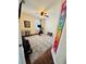 Home gym with stationary bike, weights and mirror at 2602 W Nassau St, Tampa, FL 33607