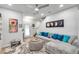 Spacious living room with sectional sofa and large TV at 2602 W Nassau St, Tampa, FL 33607