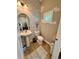 Half bathroom with pedestal sink and toilet at 2602 W Nassau St, Tampa, FL 33607