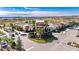 Community clubhouse and pool with surrounding landscape at 31428 Briars Ml, San Antonio, FL 33576