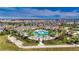 Large community pool and amenity complex with tennis courts at 31428 Briars Ml, San Antonio, FL 33576