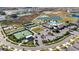 Large community pool and amenity complex with tennis courts at 31428 Briars Ml, San Antonio, FL 33576