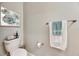 Clean bathroom with pedestal sink and decorative towel at 31428 Briars Ml, San Antonio, FL 33576