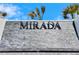 Modern community entrance sign for Mirada community at 31428 Briars Ml, San Antonio, FL 33576