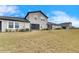Townhomes with screened patios and grassy yards at 31428 Briars Ml, San Antonio, FL 33576