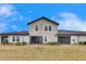 Two-story townhome with screened patio and backyard at 31428 Briars Ml, San Antonio, FL 33576