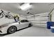 Garage with car, bike storage, and extra space at 31428 Briars Ml, San Antonio, FL 33576