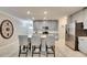 Modern kitchen with stainless steel appliances and island at 31428 Briars Ml, San Antonio, FL 33576