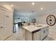 Open concept kitchen with island and pantry at 31428 Briars Ml, San Antonio, FL 33576