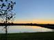 Serene lake view at sunset at 31428 Briars Ml, San Antonio, FL 33576