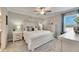 Main bedroom with ceiling fan and dresser at 31428 Briars Ml, San Antonio, FL 33576