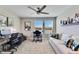 Office space with desk, chair, and comfortable couch at 31428 Briars Ml, San Antonio, FL 33576