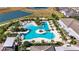 Aerial view of a large resort-style pool with surrounding lounge chairs at 31428 Briars Ml, San Antonio, FL 33576