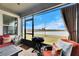 Enjoy lake views from this screened porch with patio furniture at 31428 Briars Ml, San Antonio, FL 33576