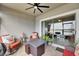 Outdoor patio with seating and lake view at 31428 Briars Ml, San Antonio, FL 33576