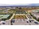Aerial view of tennis courts with surrounding landscape and parking at 31428 Briars Ml, San Antonio, FL 33576