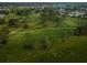 Aerial view of a lush green golf course at 3521 Teeside Dr # 3521, New Port Richey, FL 34655