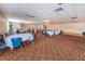Large banquet hall with tables and chairs at 3521 Teeside Dr # 3521, New Port Richey, FL 34655
