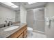 Clean bathroom with granite countertop and shower/tub combo at 3521 Teeside Dr # 3521, New Port Richey, FL 34655