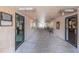 Hallway connecting the golf shop and lounge areas at 3521 Teeside Dr # 3521, New Port Richey, FL 34655