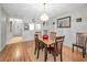 Simple dining area with wooden table and chairs at 3521 Teeside Dr # 3521, New Port Richey, FL 34655
