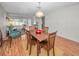 Dining area with view into living room and golf course at 3521 Teeside Dr # 3521, New Port Richey, FL 34655