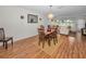 Dining area with view into living room and golf course at 3521 Teeside Dr # 3521, New Port Richey, FL 34655