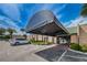 Building entrance with covered awning and landscaping at 3521 Teeside Dr # 3521, New Port Richey, FL 34655