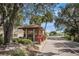 Gated community entrance with security booth at 3521 Teeside Dr # 3521, New Port Richey, FL 34655