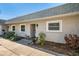 Condo building with walkway and landscaping at 3521 Teeside Dr # 3521, New Port Richey, FL 34655