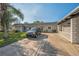 Front view of condo with carport and small lawn at 3521 Teeside Dr # 3521, New Port Richey, FL 34655