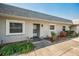 Condo entry with landscaping and walkway at 3521 Teeside Dr # 3521, New Port Richey, FL 34655