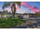 Attractive condo building with carport and landscaping at 3521 Teeside Dr # 3521, New Port Richey, FL 34655