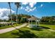 White gazebo with walking path near pool at 3521 Teeside Dr # 3521, New Port Richey, FL 34655