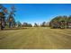 Wide view of a lush golf course at 3521 Teeside Dr # 3521, New Port Richey, FL 34655