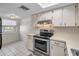 Bright kitchen featuring stainless steel appliances at 3521 Teeside Dr # 3521, New Port Richey, FL 34655