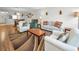 Open living room featuring ample seating and hardwood floors at 3521 Teeside Dr # 3521, New Port Richey, FL 34655