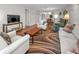 Bright living room with comfy seating and a dining area view at 3521 Teeside Dr # 3521, New Port Richey, FL 34655