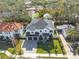 Aerial view of a two-story home in a residential neighborhood at 4306 W Barcelona St, Tampa, FL 33629