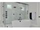 Elegant bathroom with soaking tub and walk-in shower at 4306 W Barcelona St, Tampa, FL 33629