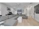 Entertaining game room with a large sectional sofa and wet bar at 4306 W Barcelona St, Tampa, FL 33629