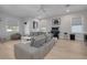 Relaxing game room featuring a sectional sofa and arcade game at 4306 W Barcelona St, Tampa, FL 33629