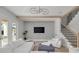 Gathering room with gray chevron wall and comfortable seating at 4306 W Barcelona St, Tampa, FL 33629