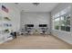 Home office with two desks, large windows and hardwood floors at 4306 W Barcelona St, Tampa, FL 33629