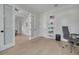 Bright home office with hardwood floors and built-in shelving at 4306 W Barcelona St, Tampa, FL 33629
