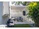 Modern outdoor patio with seating and bar area at 4306 W Barcelona St, Tampa, FL 33629